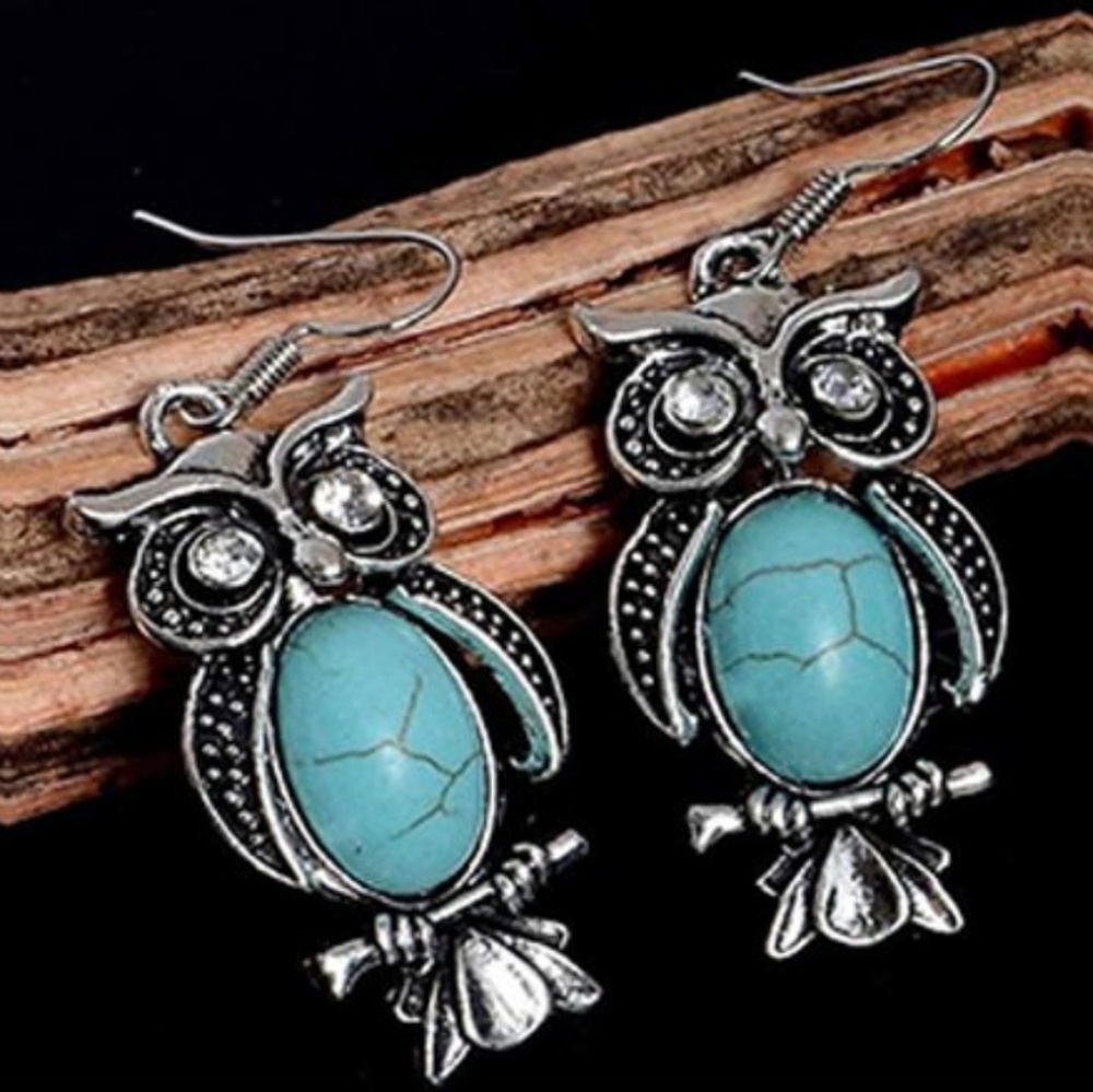 Plated owl drop earrings